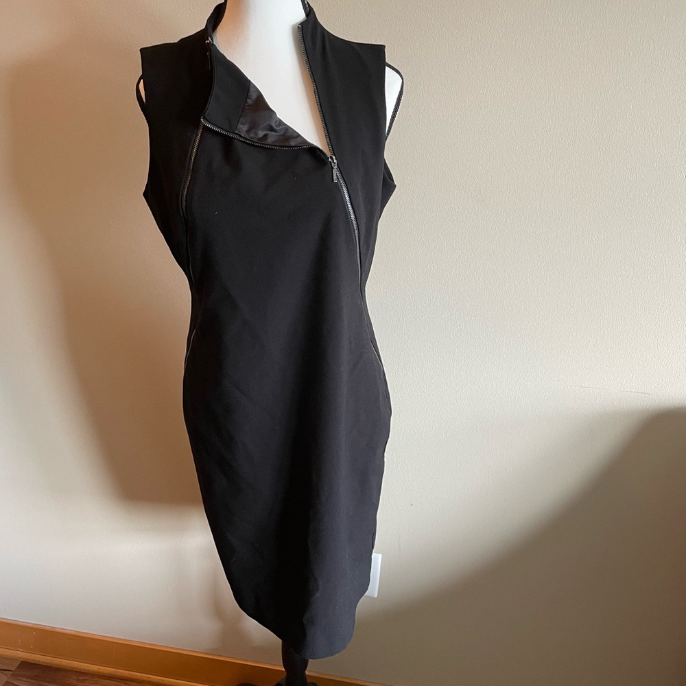 Calvin Klein fitted black dress with zipper detail.